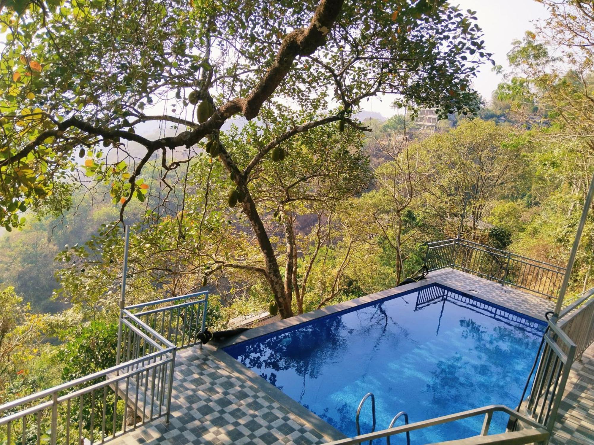 Sunset Valley Kerala Pool Resort - Serene Natural Forest Cottage Stay In Idukki With Sunrise & Sunset Panoramas, Natural Streams & Tranquil Summer Evenings Pīrmed Екстериор снимка